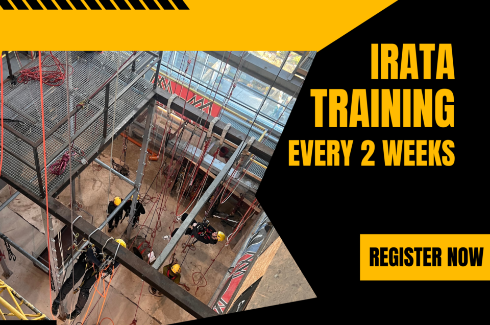 IRATA rope access trainees performing ascent and descent exercises under instructor supervision.